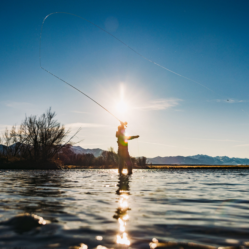 Fly Fishing Woman In Rural Montana